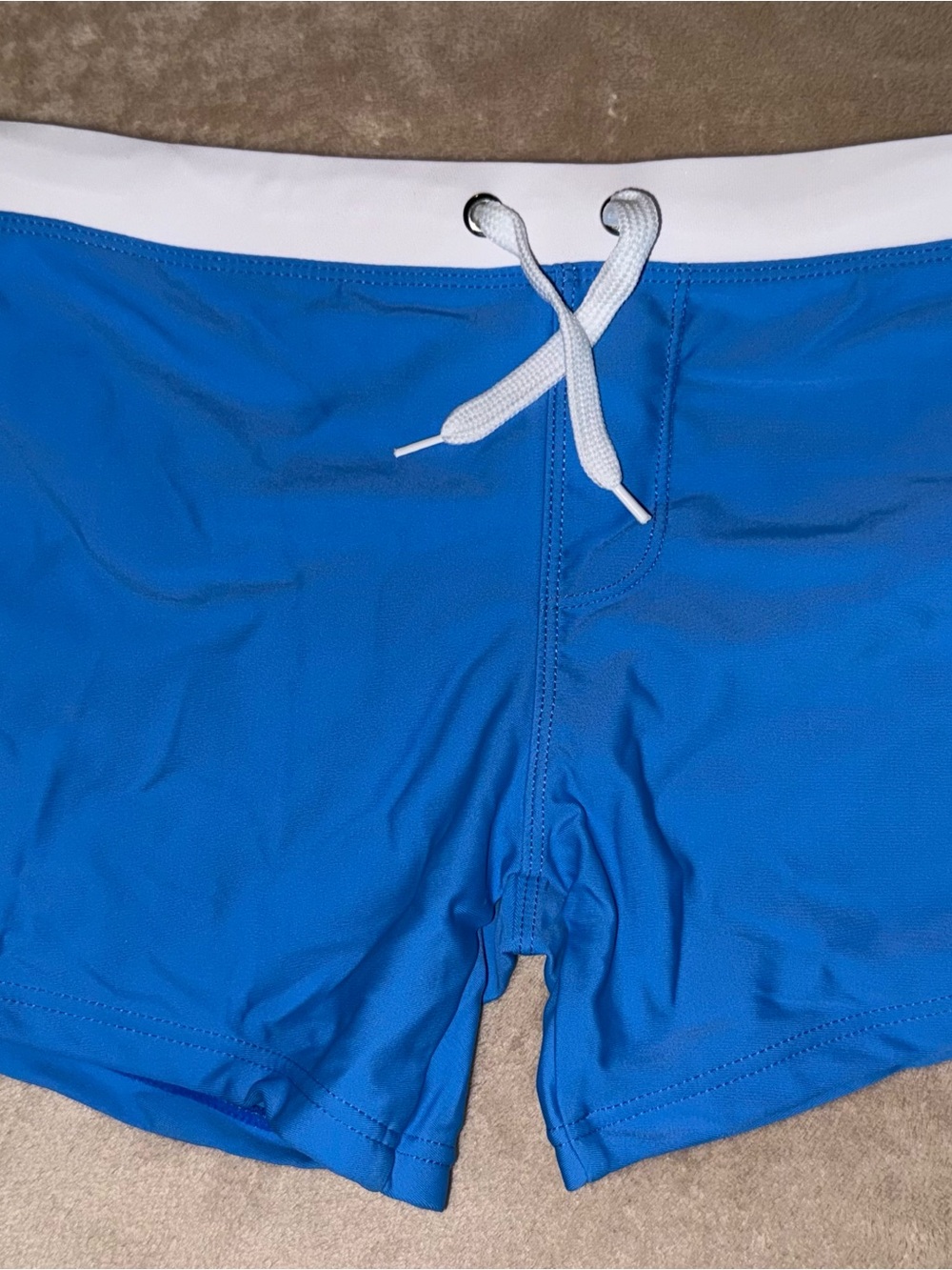 Source Unknown Bright Blue Swim Shorts with White Waistband.Two listed separated